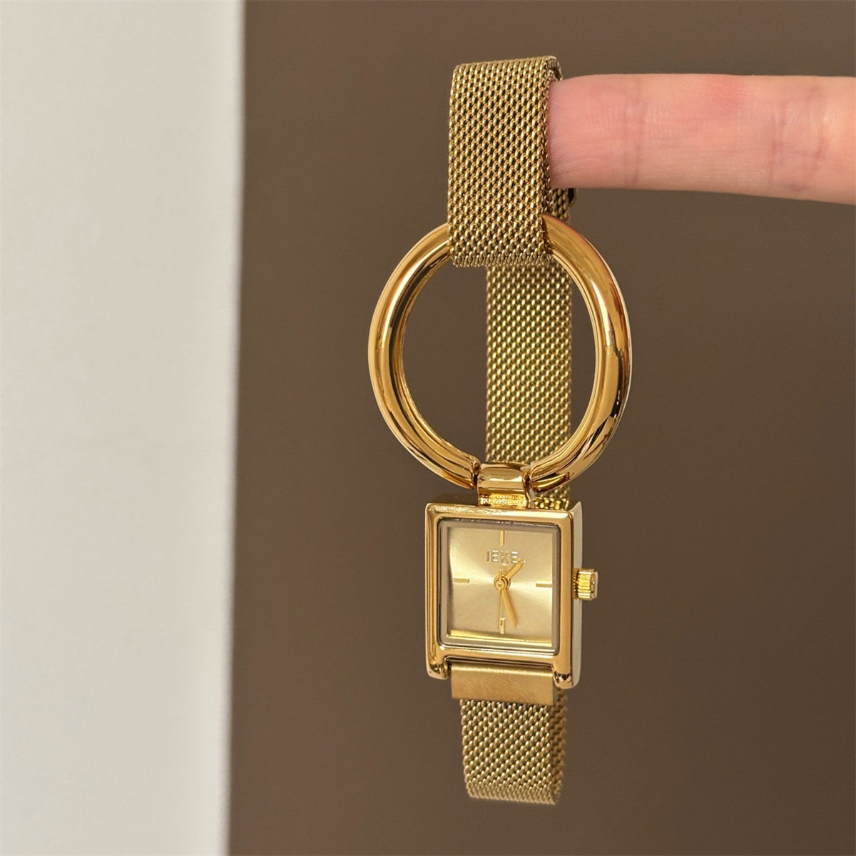 IEKE gold square quartz watch with oversized ring and magnetic mesh strap