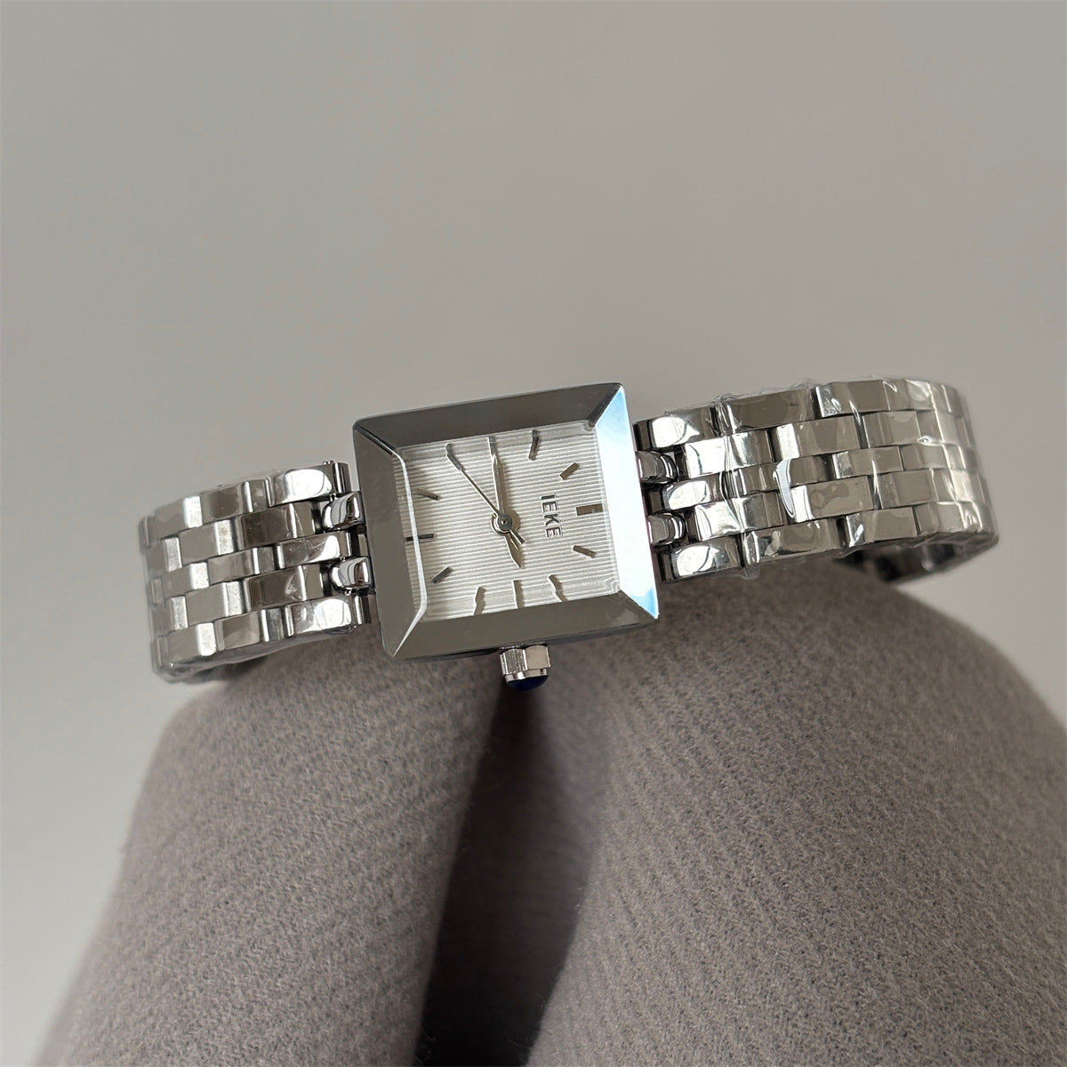 IEKE petite square bracelet watch in silver tone with white dial