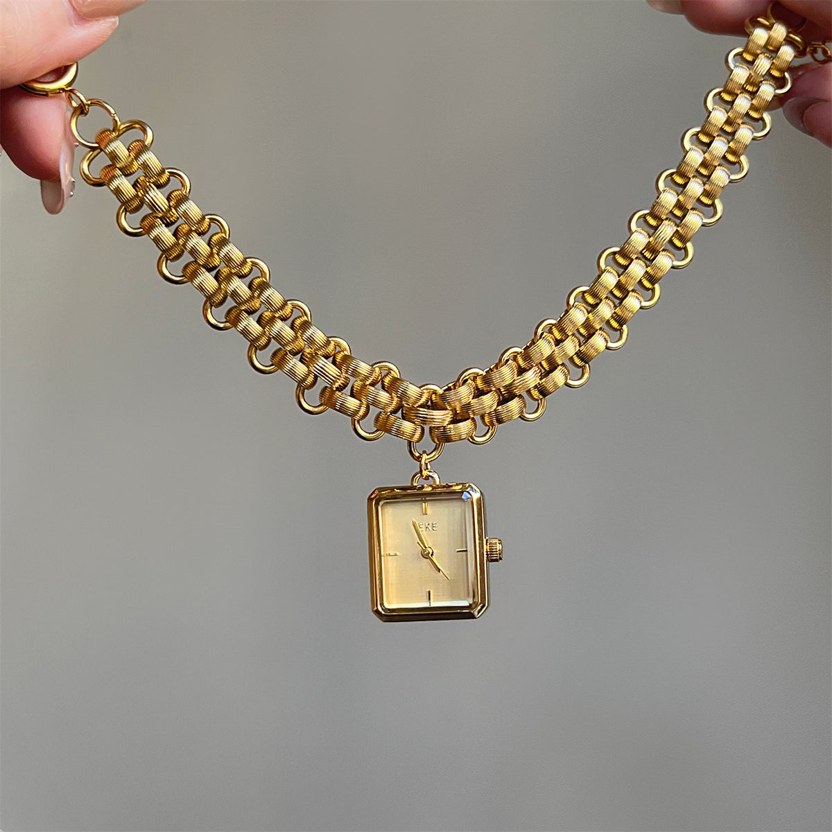 IEKE square chain bracelet watch with gold-tone metal strap and champagne dial