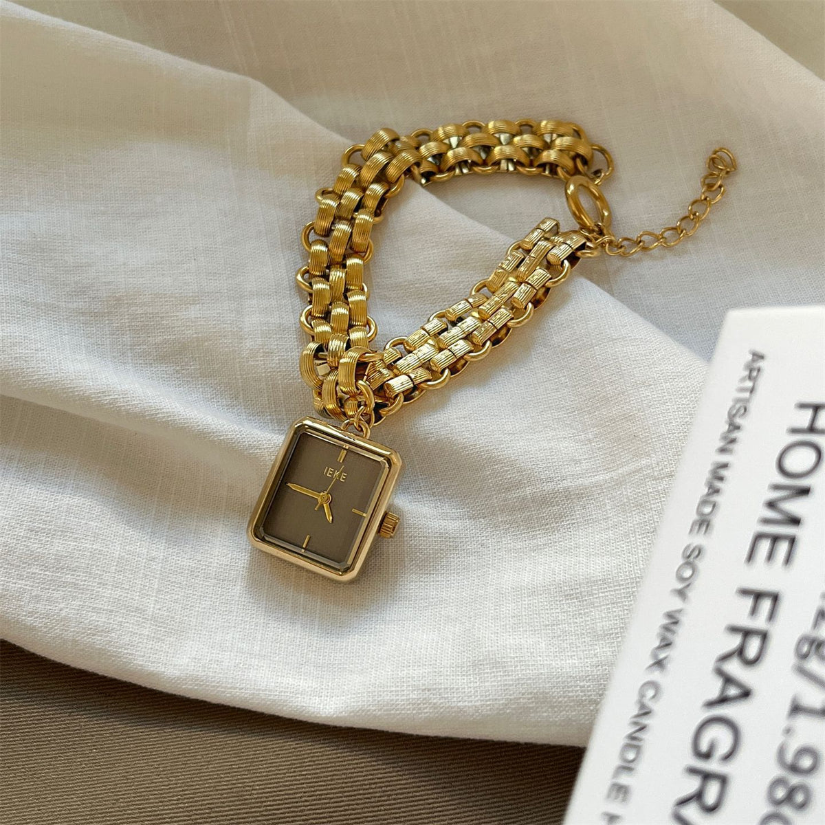 IEKE square chain bracelet watch with gold-tone metal strap and taupe grey dial
