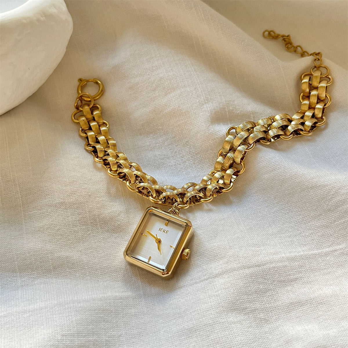 IEKE square chain bracelet watch with gold-tone metal strap and white dial