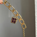 IEKE vintage charm bracelet watch with gold-tone open-link bracelet and burgundy dial