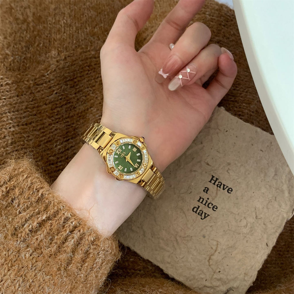 IEKE vintage crystal bezel round bracelet watch with green dial worn on wrist