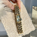 IEKE vintage rectangular chain bracelet watch in gold tone with light dial
