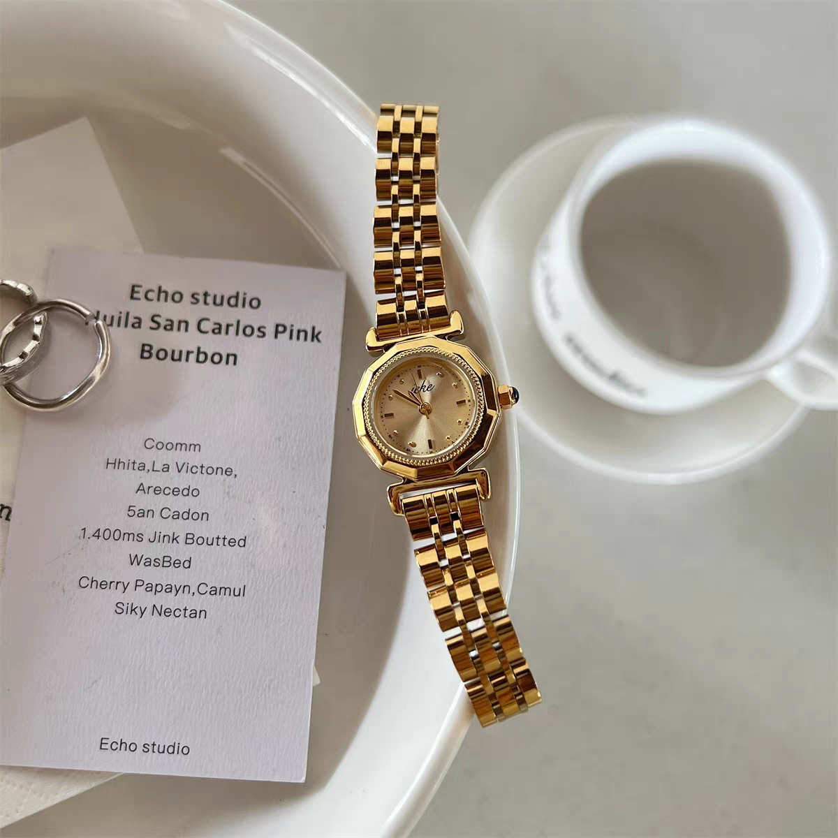 IEKE vintage round women's gold-tone bracelet watch with champagne dial