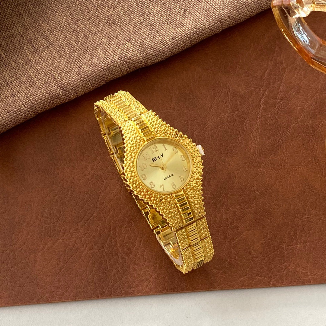 ISLY textured gold-tone stainless steel bracelet watch with champagne dial