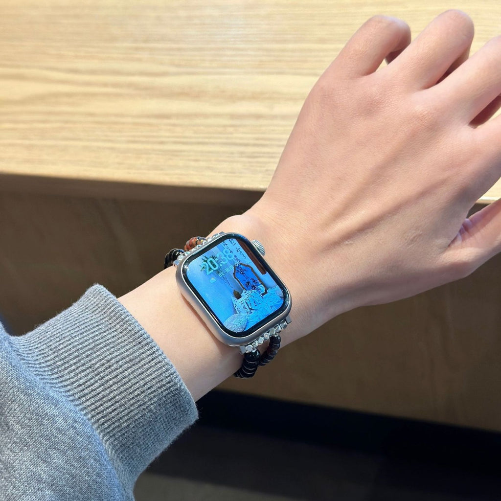 Dark beaded jewellery Apple Watch bracelet band worn on wrist