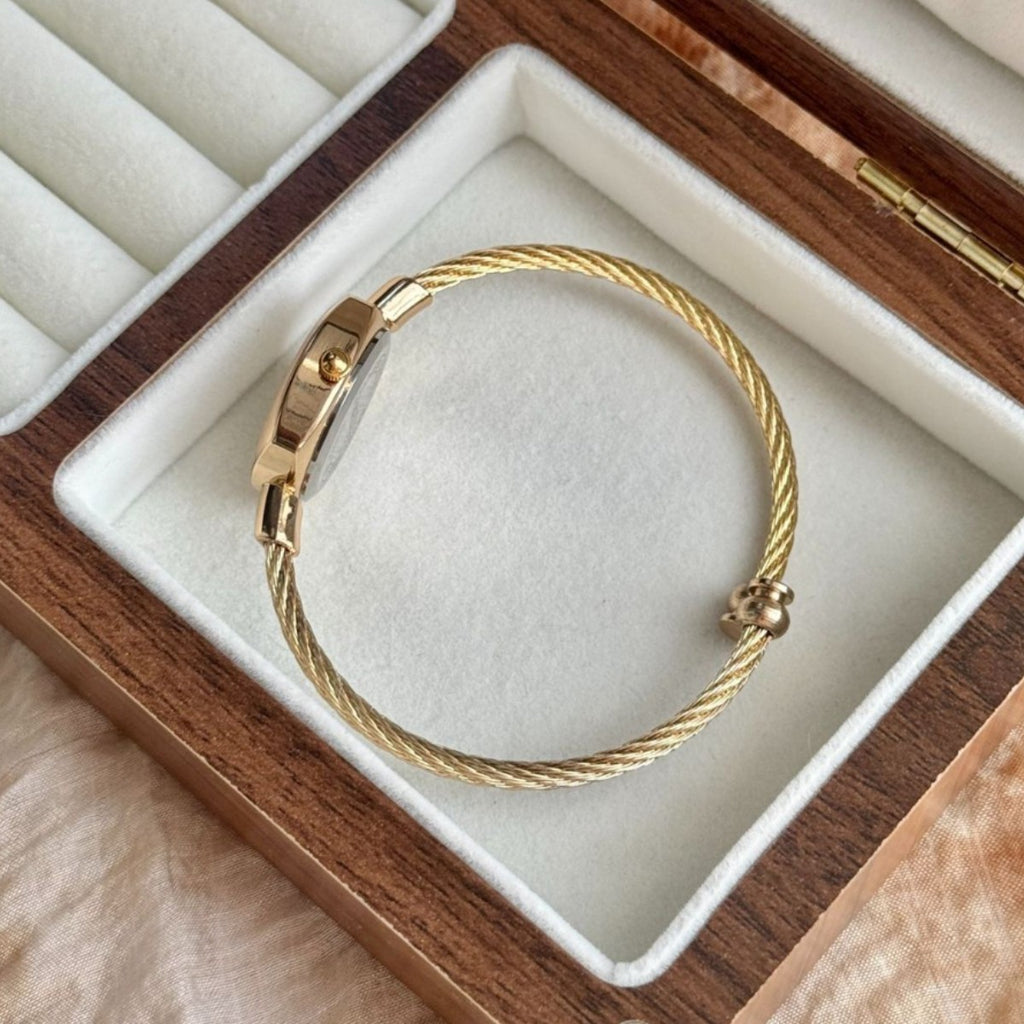 NAIDU gold-tone braided stainless steel bangle watch bracelet detail