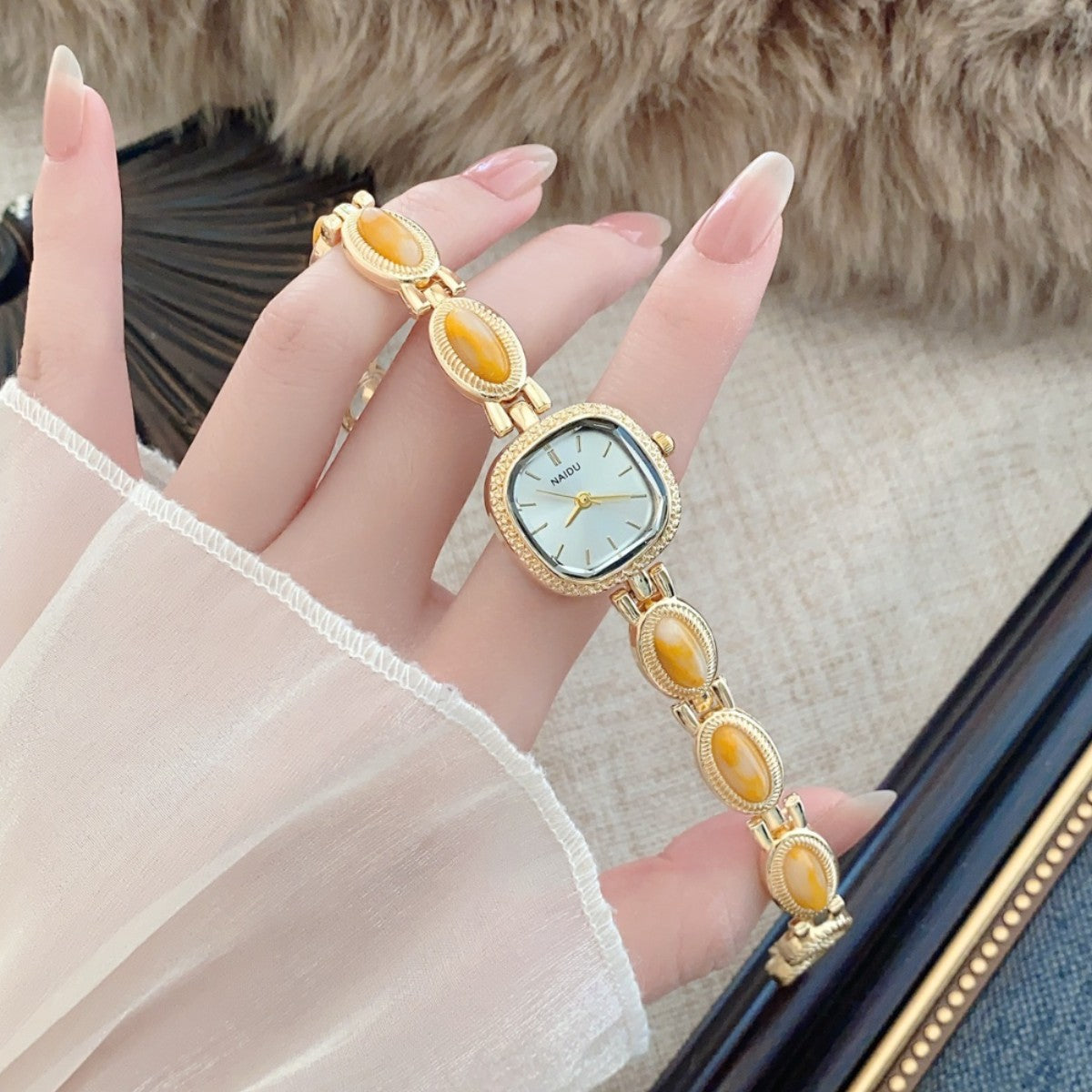 NAIDU cabochon-style jewelry watch with amber accents alternate view