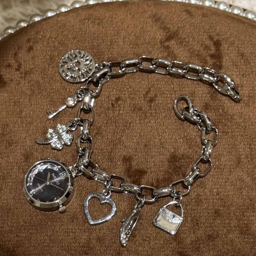 NAIDU charm bracelet watch in silver tone with black dial