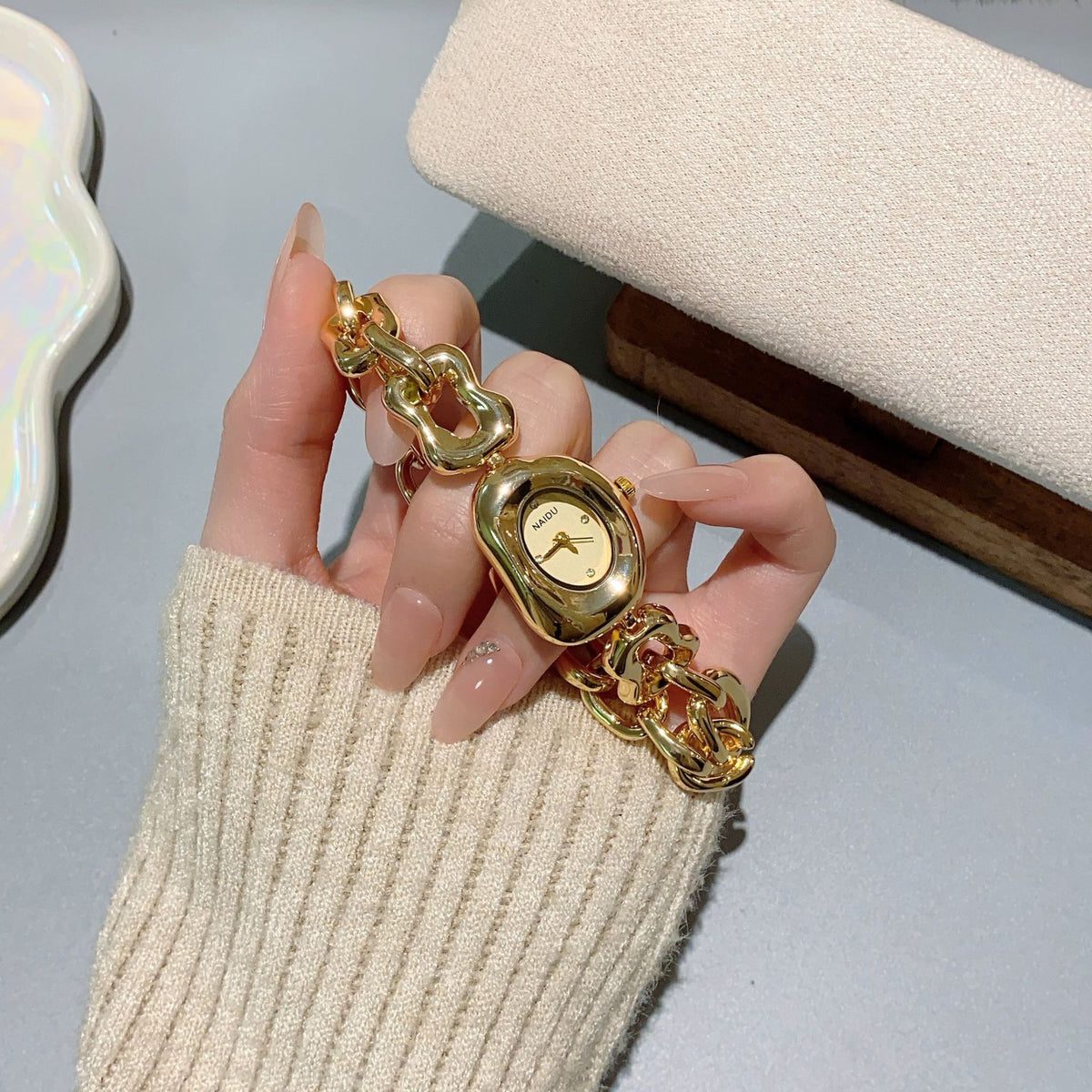 NAIDU sculpted-link jewelry watch in gold tone with champagne dial alternate view