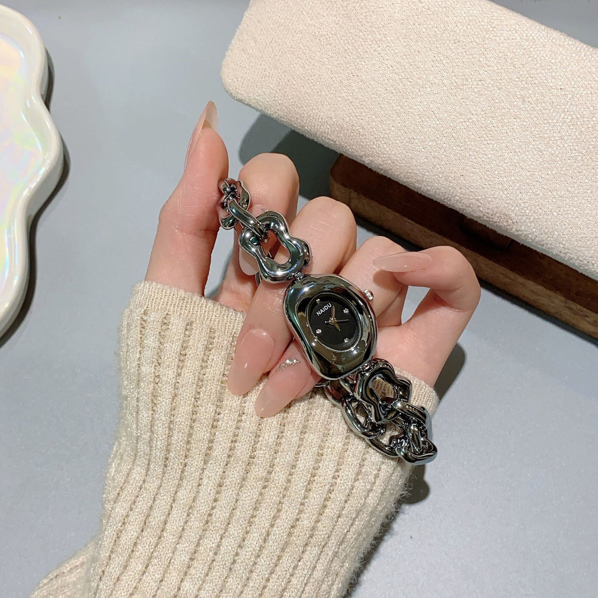 NAIDU sculpted-link jewelry watch in gunmetal tone with black dial