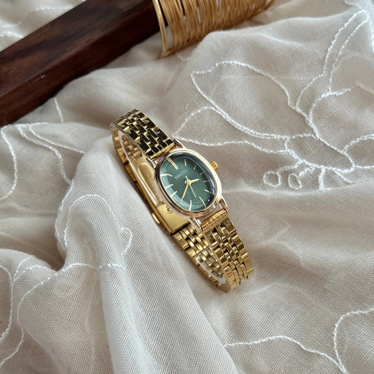 NAIDU vintage gold-tone steel bracelet quartz watch with green dial