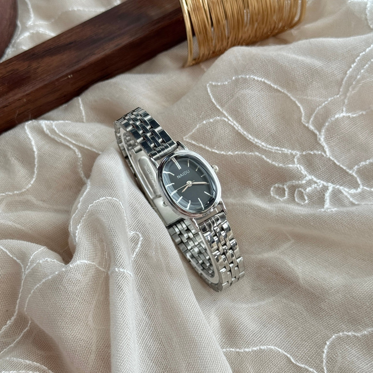 NAIDU vintage silver-tone steel bracelet quartz watch with black dial