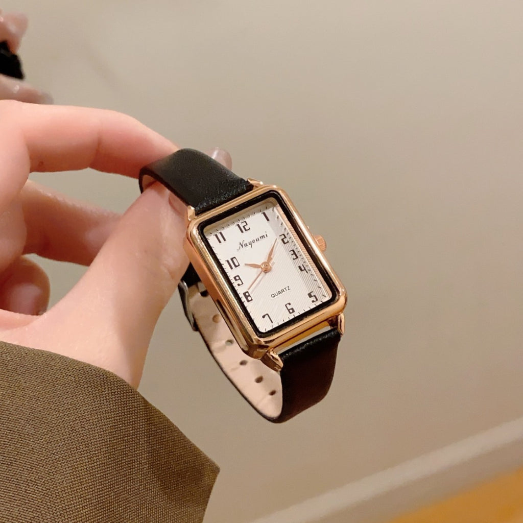 Gold rectangle women's quartz watch with black leather-style strap