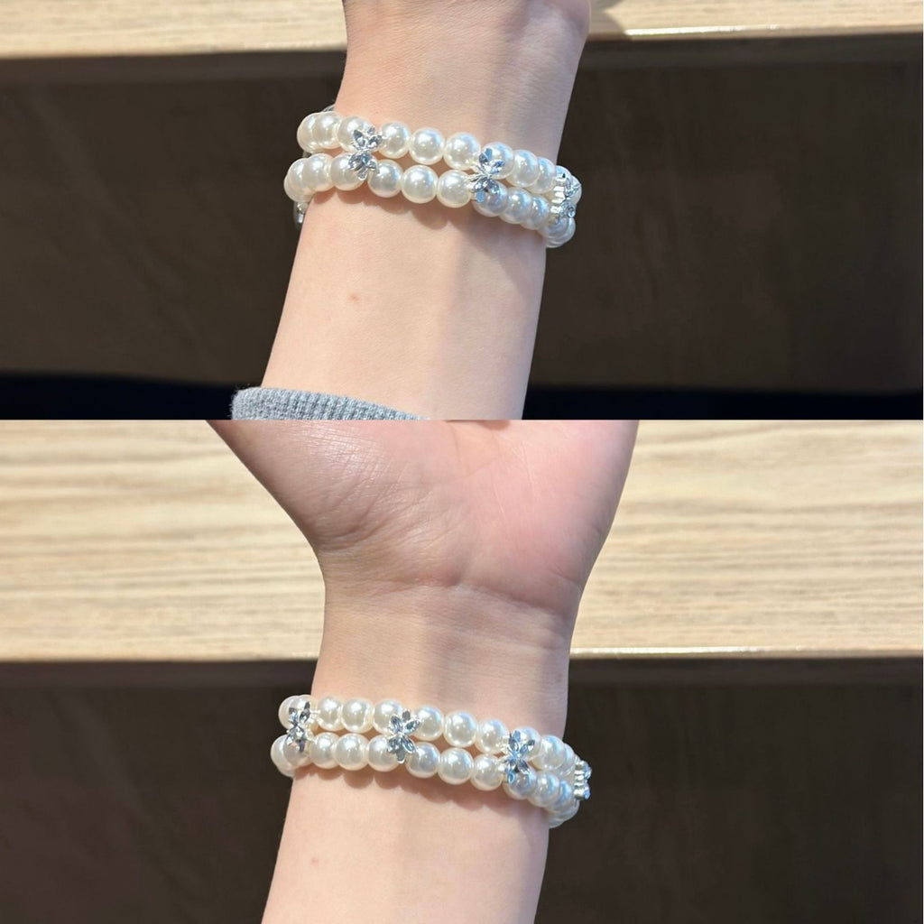 Pearl Apple Watch bracelet band worn on wrist