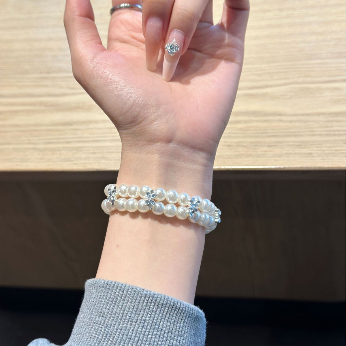 Double pearl Apple Watch band styling detail