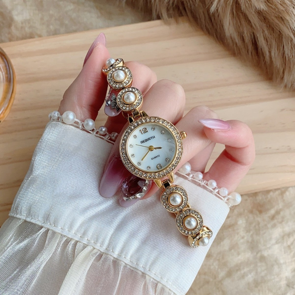 REGIRTH pearl crystal-style round bracelet watch in gold tone alternate view