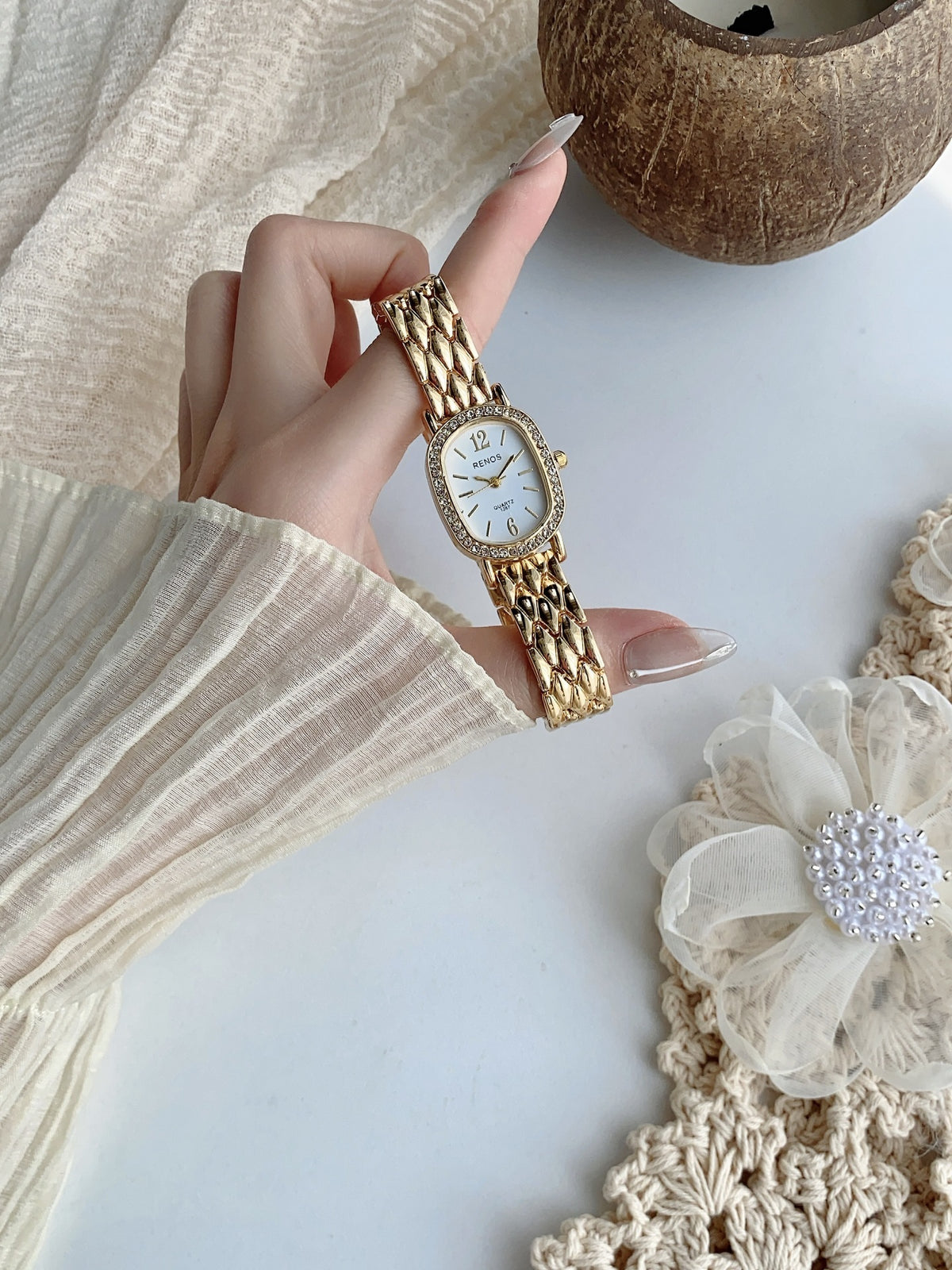 RENOS crystal-style cushion watch in gold tone with white dial