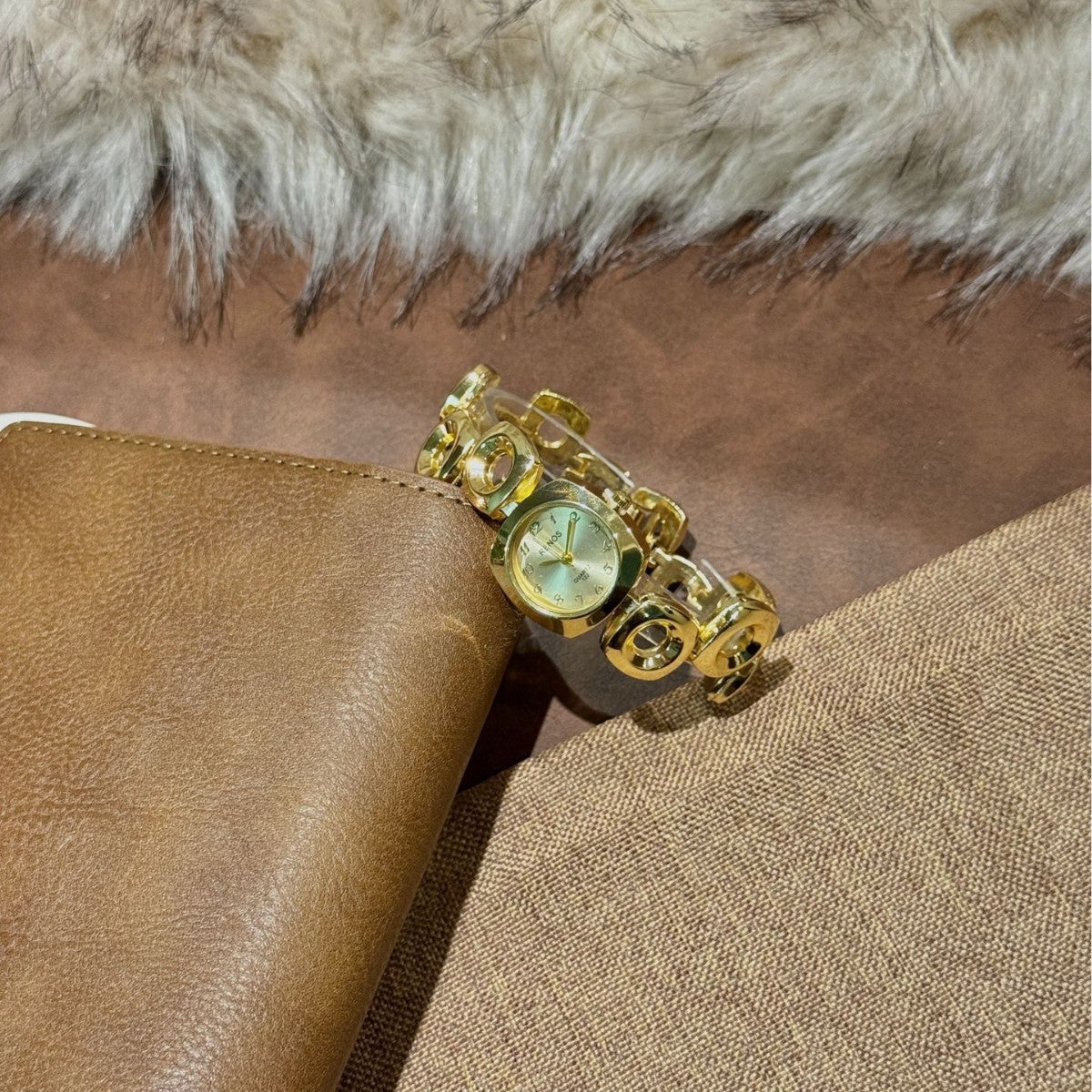 RENOS geometric open-link bracelet watch with mint dial