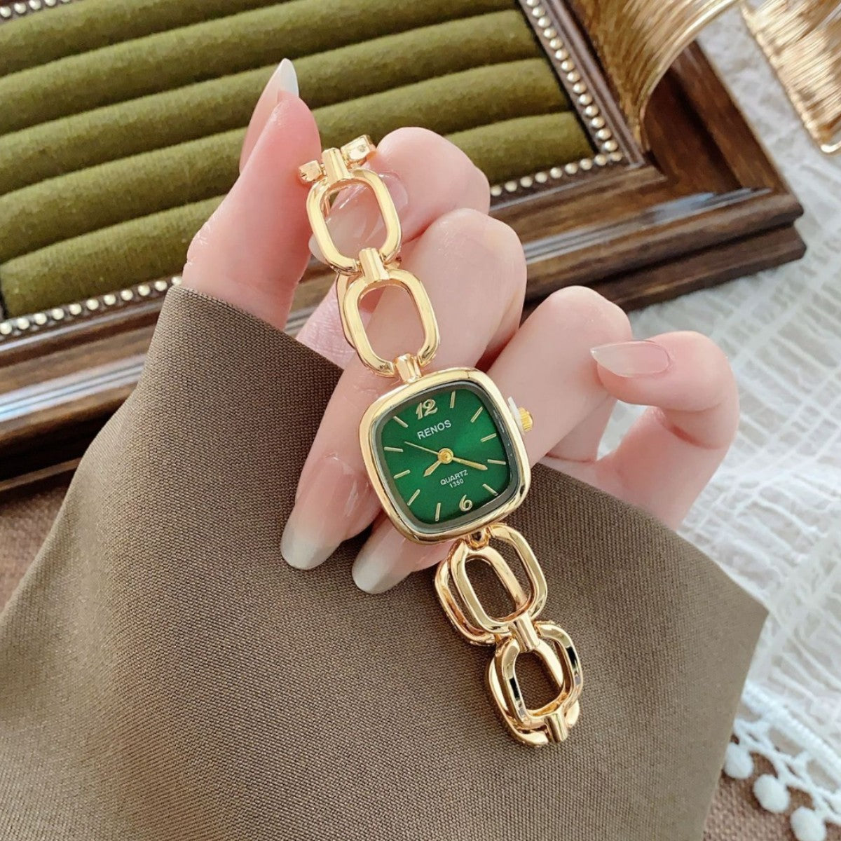 RENOS open-link cushion bracelet watch in gold tone with green dial