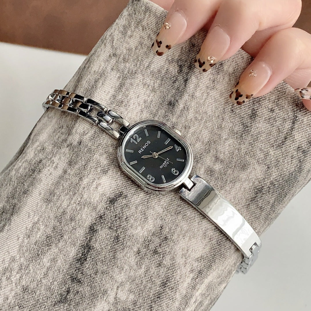 RENOS vintage cushion-link bracelet quartz watch in silver tone with black dial