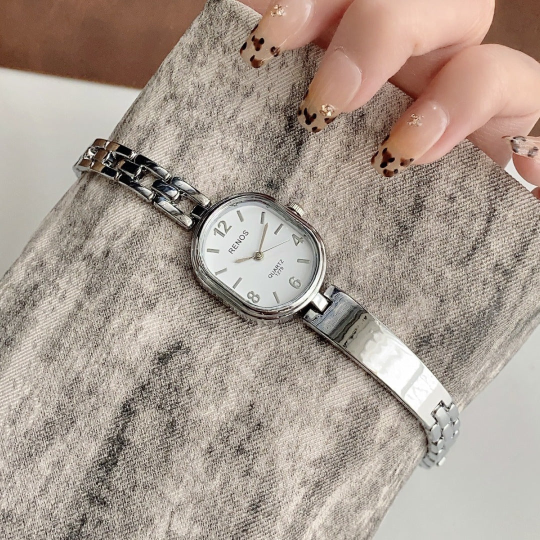 RENOS vintage cushion-link bracelet quartz watch in silver tone with white dial