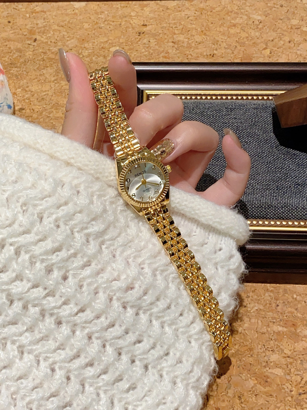 RENOS vintage gold-tone jewelry bracelet quartz watch with silver dial