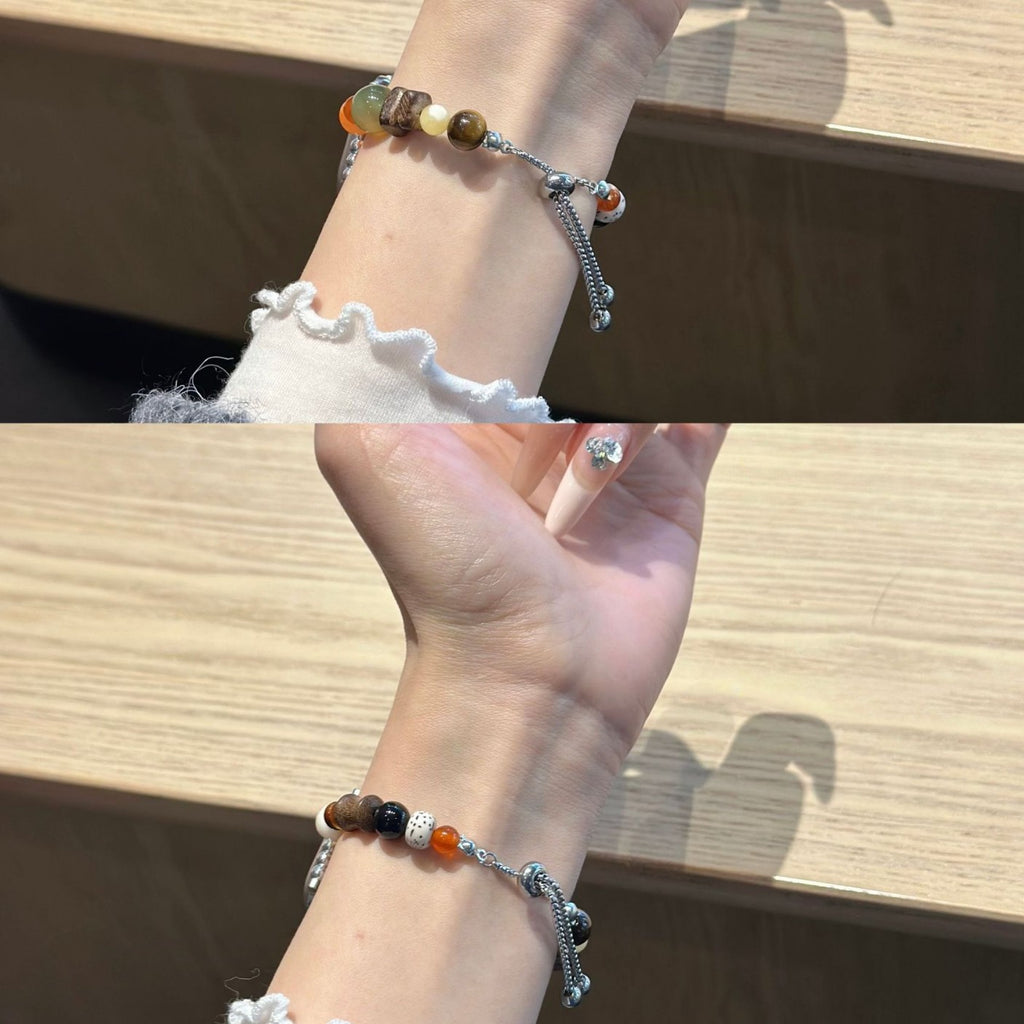 Earth-tone beaded jewellery Apple Watch band worn on wrist