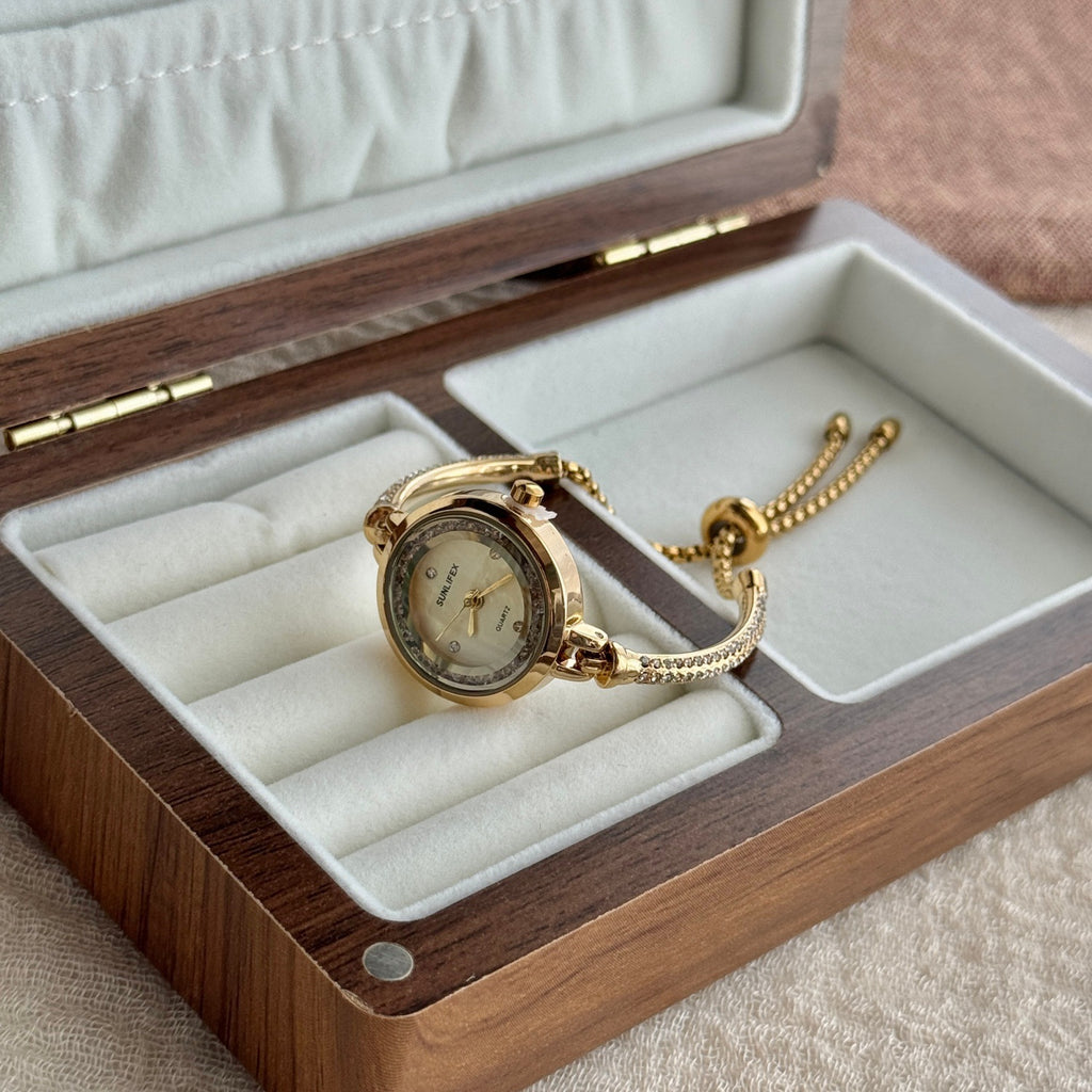 SUNLIFEX adjustable chain bracelet watch in gold tone with champagne dial in presentation box