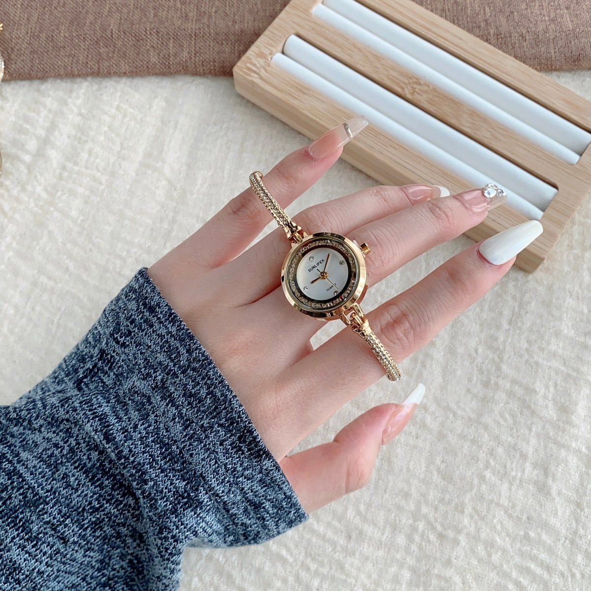 SUNLIFEX adjustable chain bracelet watch in gold tone with white dial