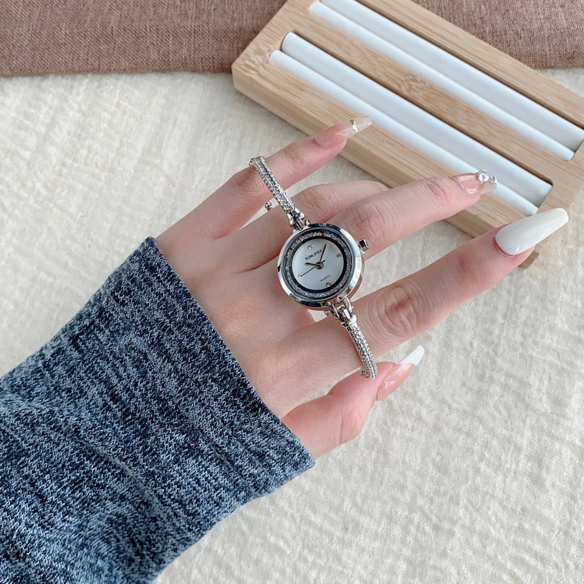 SUNLIFEX adjustable chain bracelet watch in silver tone with white dial