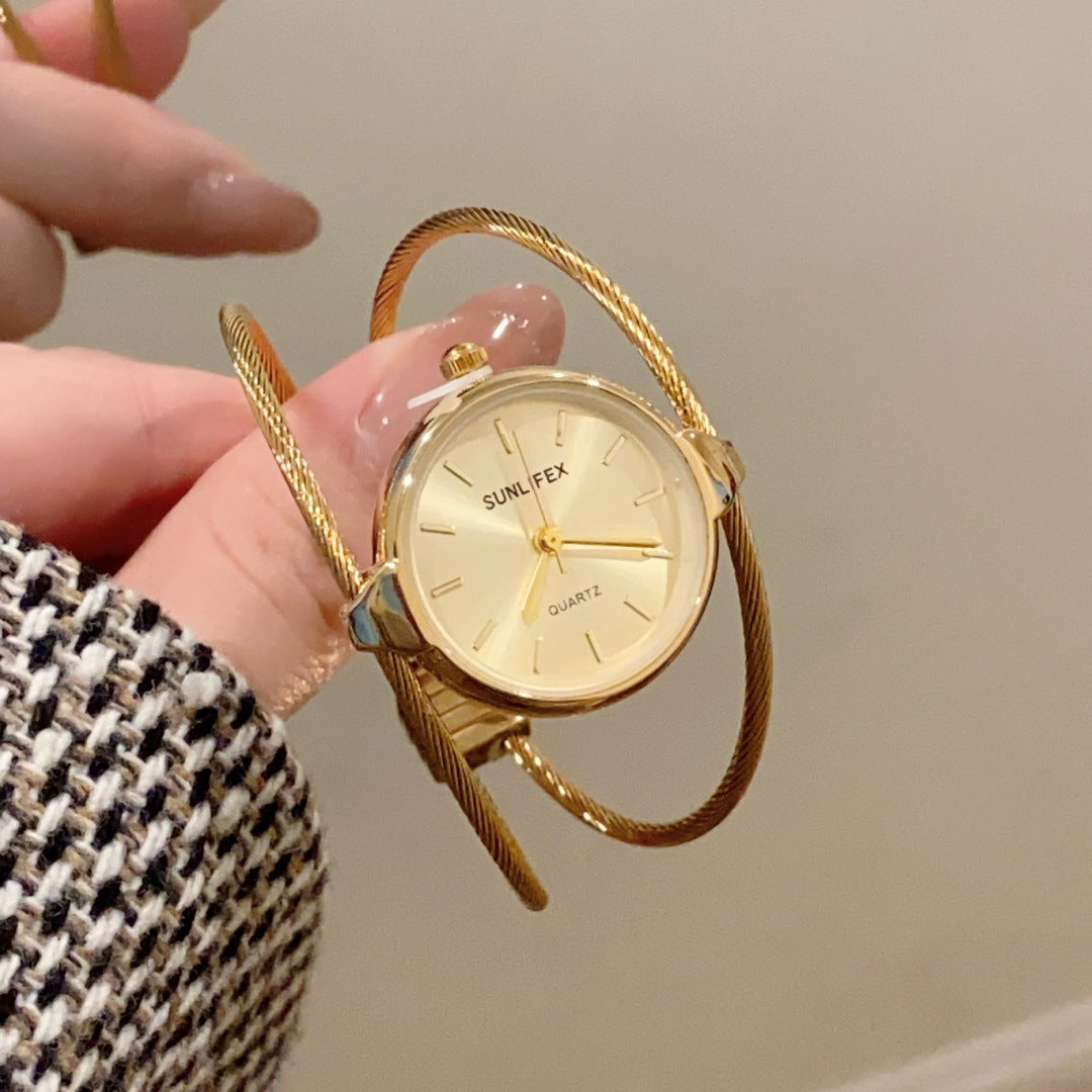 SUNLIFEX women's open bangle quartz watch in gold tone with champagne dial