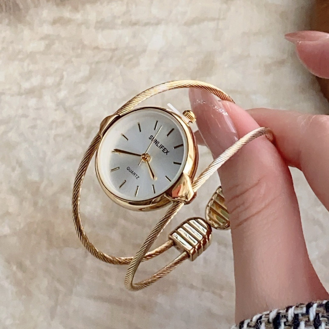 SUNLIFEX women's open bangle quartz watch in gold tone with white dial