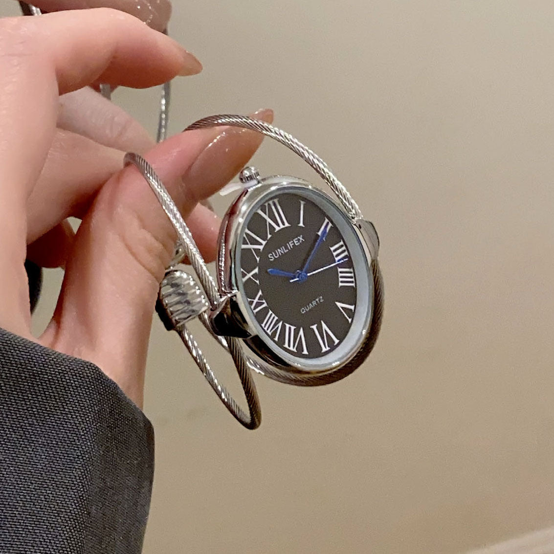 SUNLIFEX women's open bangle quartz watch in silver tone with black Roman numeral dial