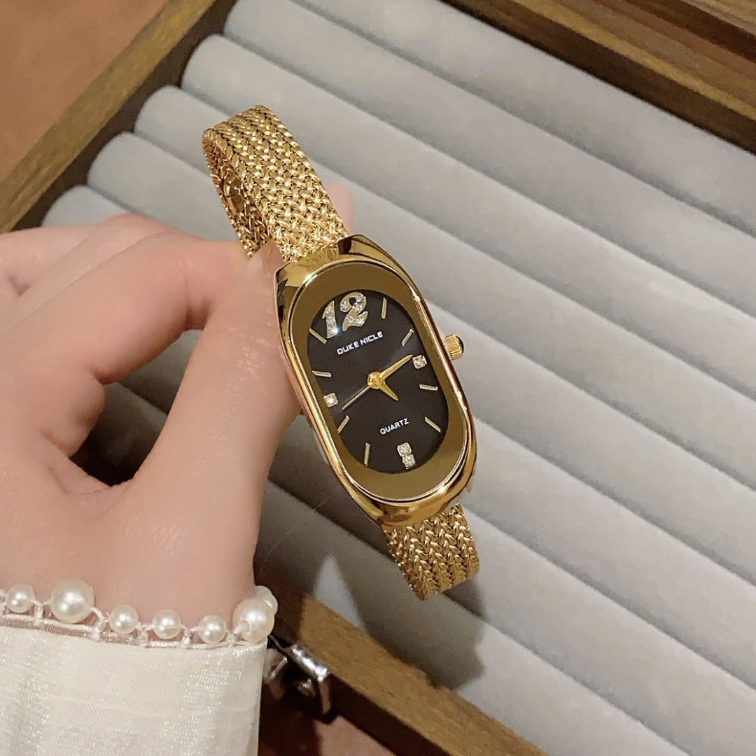 SUNLIFEX oval mesh bracelet watch in gold tone with black dial