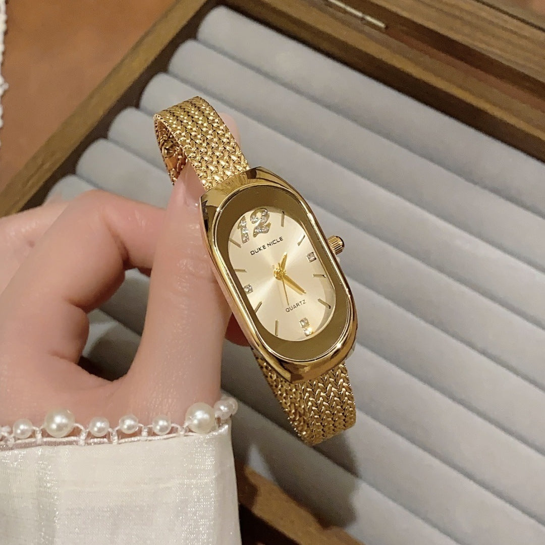 SUNLIFEX oval mesh bracelet watch in gold tone with champagne dial