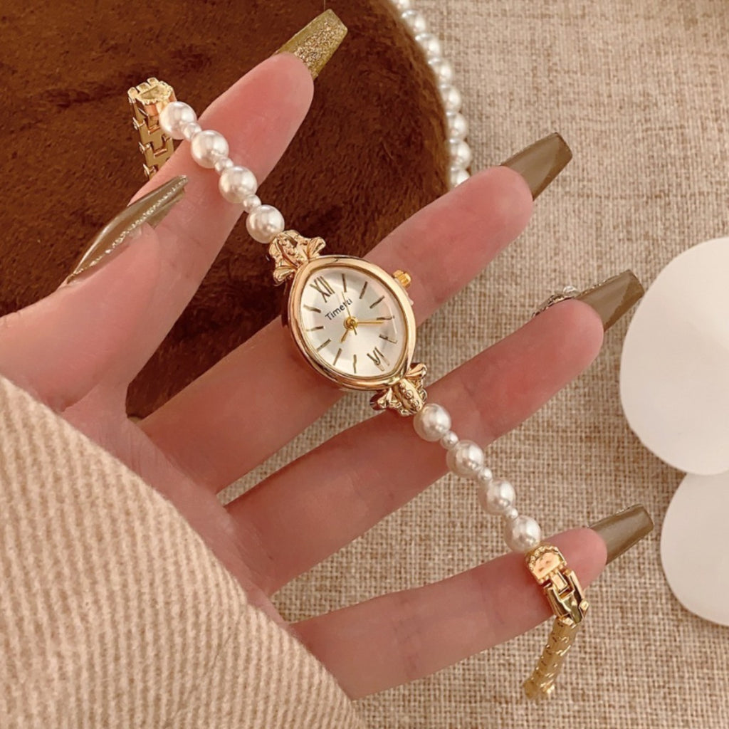 Timett single-pearl bracelet watch in gold tone