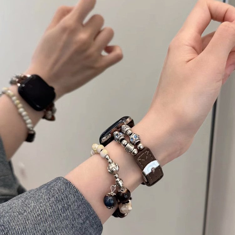 Beaded leather Apple Watch band with charm bracelet styling