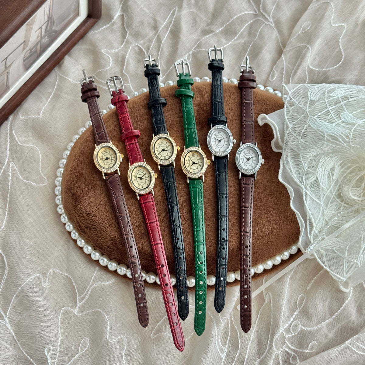 Six variants of petite vintage oval women's crystal-style watches