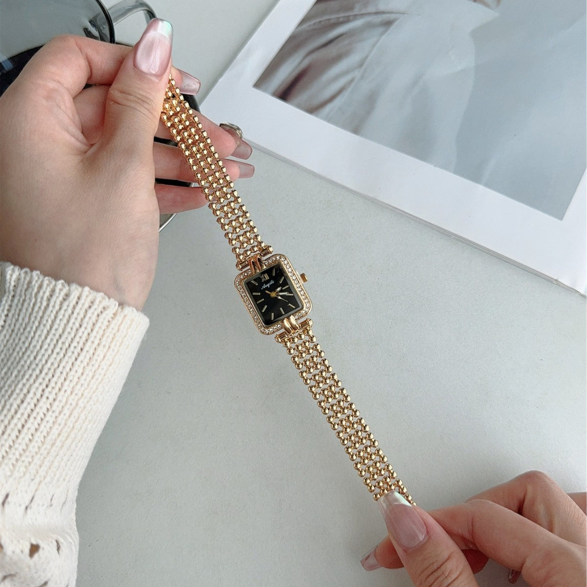 Vintage gold-tone square crystal-style jewelry bracelet quartz watch with black dial