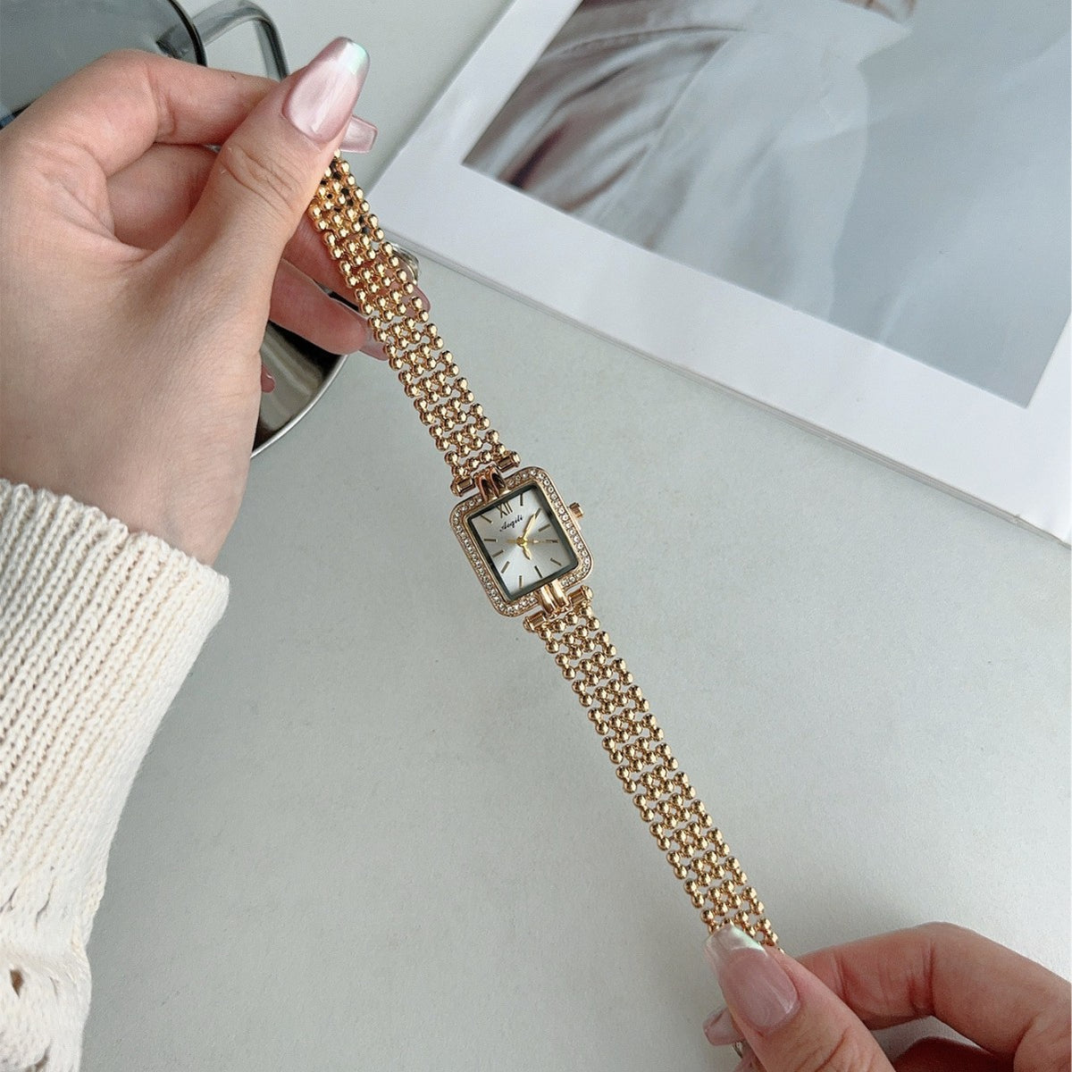 Vintage gold-tone square crystal-style jewelry bracelet quartz watch with light dial