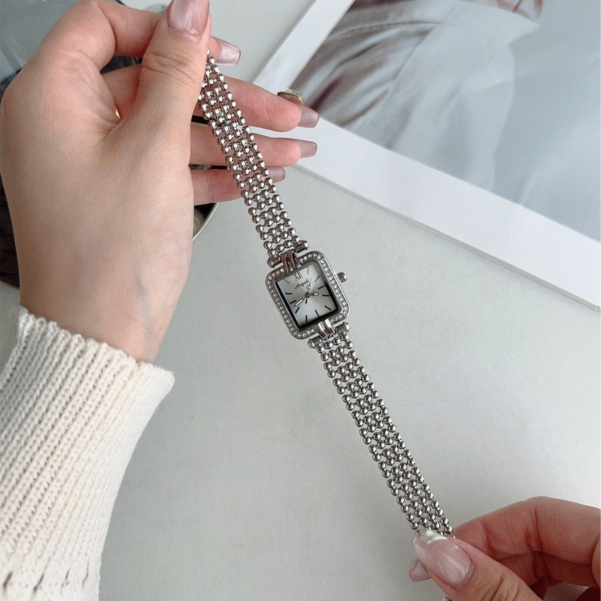 Vintage silver-tone square crystal-style jewelry bracelet quartz watch with white dial
