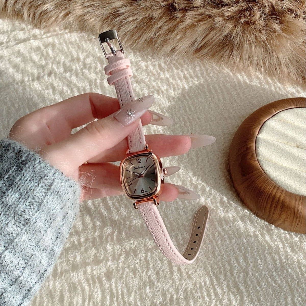 Vintage rose gold cushion case women's watch with blush pink strap and silver dial, alternate view