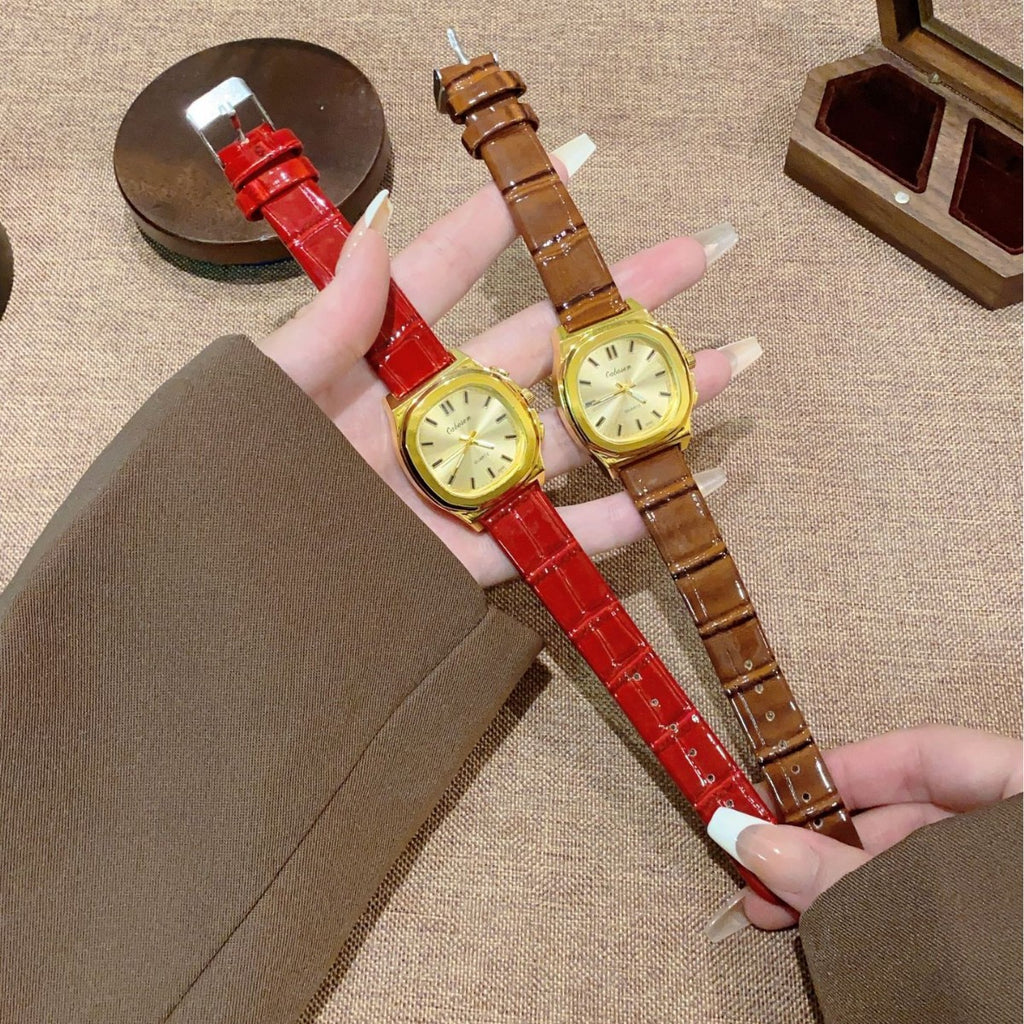 Vintage gold-tone cushion women's watch shown in red and brown croc-embossed leather-style straps