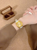 Vintage gold-tone cushion women's watch with white croc-embossed leather-style strap