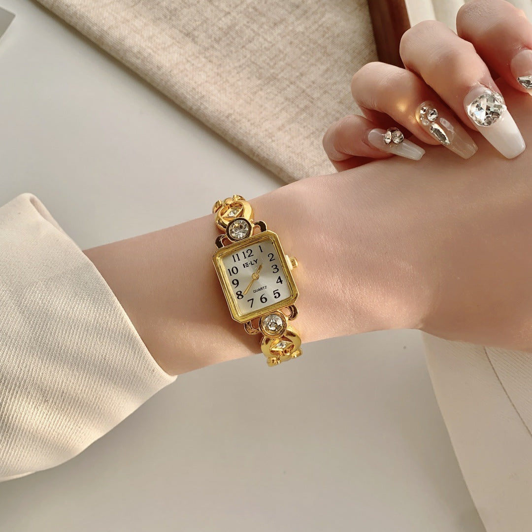 Women's vintage gold-tone rectangular jewelry bracelet quartz watch with crystal-style details