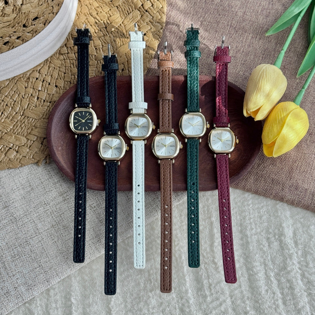 Six colorways of petite rounded-square women's vintage watches