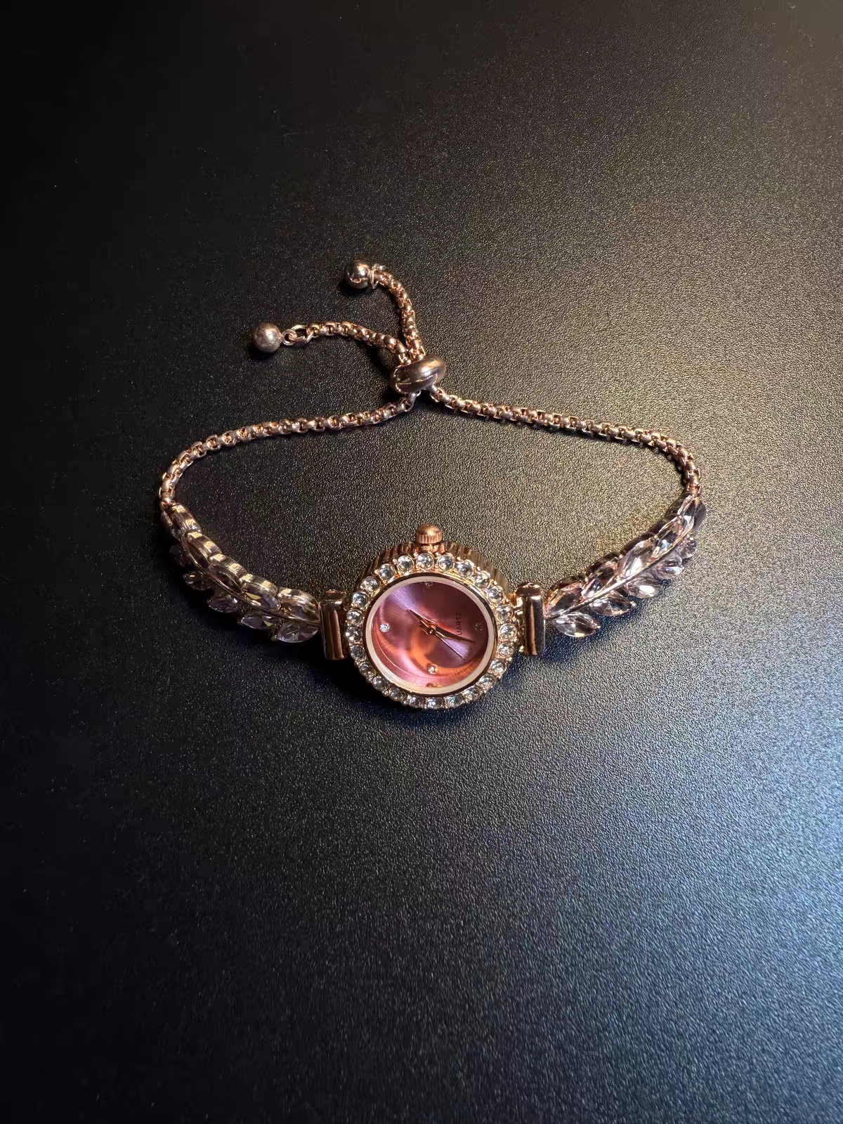 Front view vintage pink dial crystal leaf bracelet watch