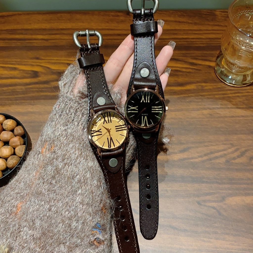 Vintage Roman numeral rivet leather-style women's watch in brown with cream and black dials